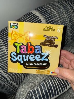 Taba Squeez Dubai Chocolate Squishy Toy - Yellow Box